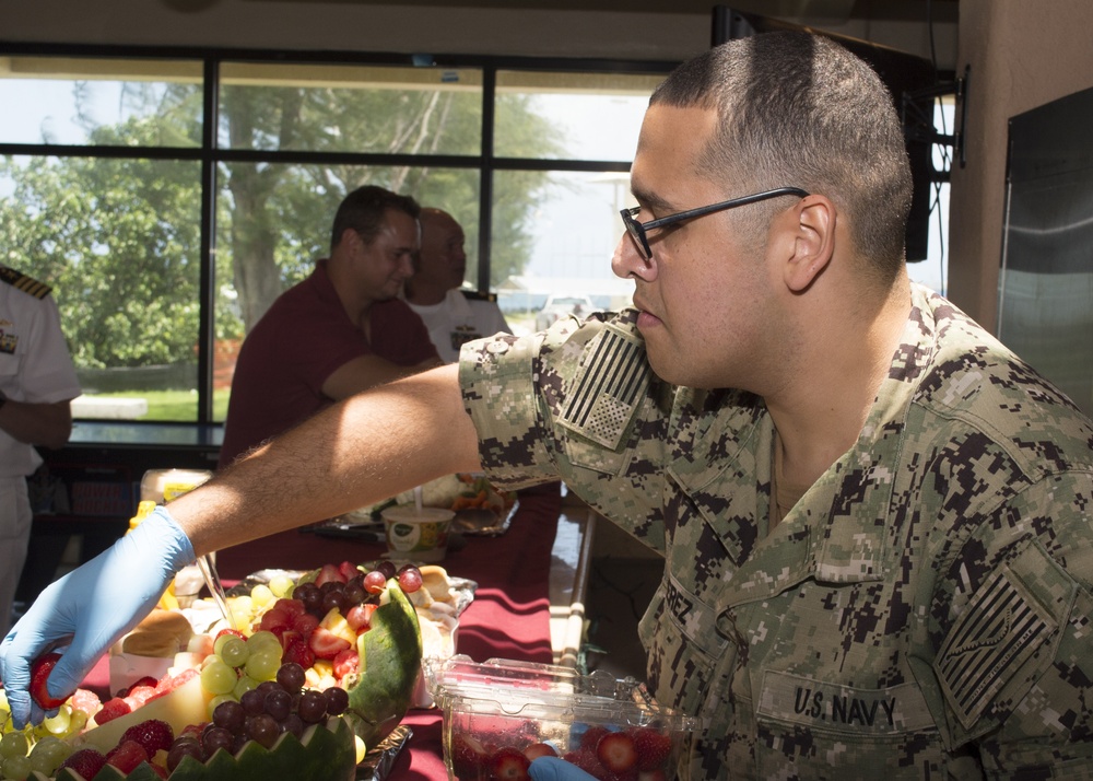 CSSN Jonathan Perez Caters Reception During COMSUBRON 15 Change of Command Reception, Aug. 17