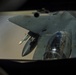 A KC-135 Stratotanker refuels F-15