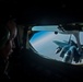 A KC-135 Stratotanker refuels F-15