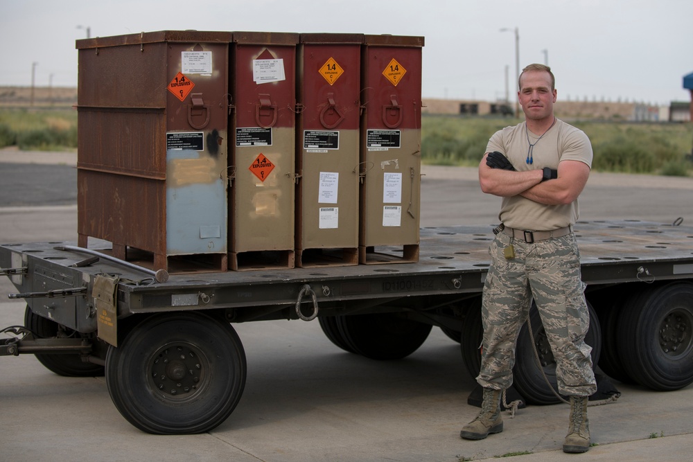 Ammo Airman loads 30 mm rounds for transport