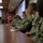 Capt. Brian J. Diebold, commodore of Destroyer Squadron (DESRON) 40, address U.S. Navy Sailors and Trinidad and Tobago military professionals during a brief