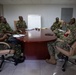 Lt. David Cruz, from San Diego, Calif., speaks with Trinidad and Tobago (TTO) military religious professionals at the TTO Defence Force headquarters