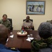 Cmdr. Israel Dowlat, force surgeon of the Trinidad and Tobago center, speaks with U.S. Navy Sailors and Trinidad and Tobago (TTO) military professionals