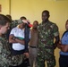 Hospital Corpsman 3rd Class Austin Jensen, from Seaboard, N.C., pulls on a dragline as part of a subject matter expert exchange with Trinidad and Tobago (TTO) military professionals