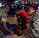 Hospital Corpsman 3rd Class Bishop Sisemore, (right) from Summers, A.R., participates in a subject matter expert exchange with Trinidad and Tobago (TTO) military professionals