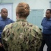 Lt. Cmdr. Stefanie Nochisaki, from Saratoga Springs, N.Y., center, participates in a subject matter expert exchange with Trinidad and Tobago (TTO) military professionals