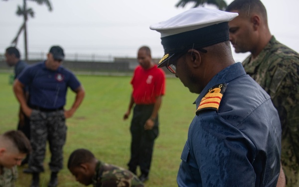 Cmdr. Israel Dowlat, the force surgeon of Trinidad and Tobago (TTO), observes U.S. Navy Sailors and TTO military professionals participating in a subject matter expert exchange