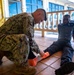 Hospital Corpsman 3rd Class Bishop Sisemore, from Summers, A.R., performs a splint as part of a subject matter expert exchange with Trinidad and Tobago (TTO) military professionals