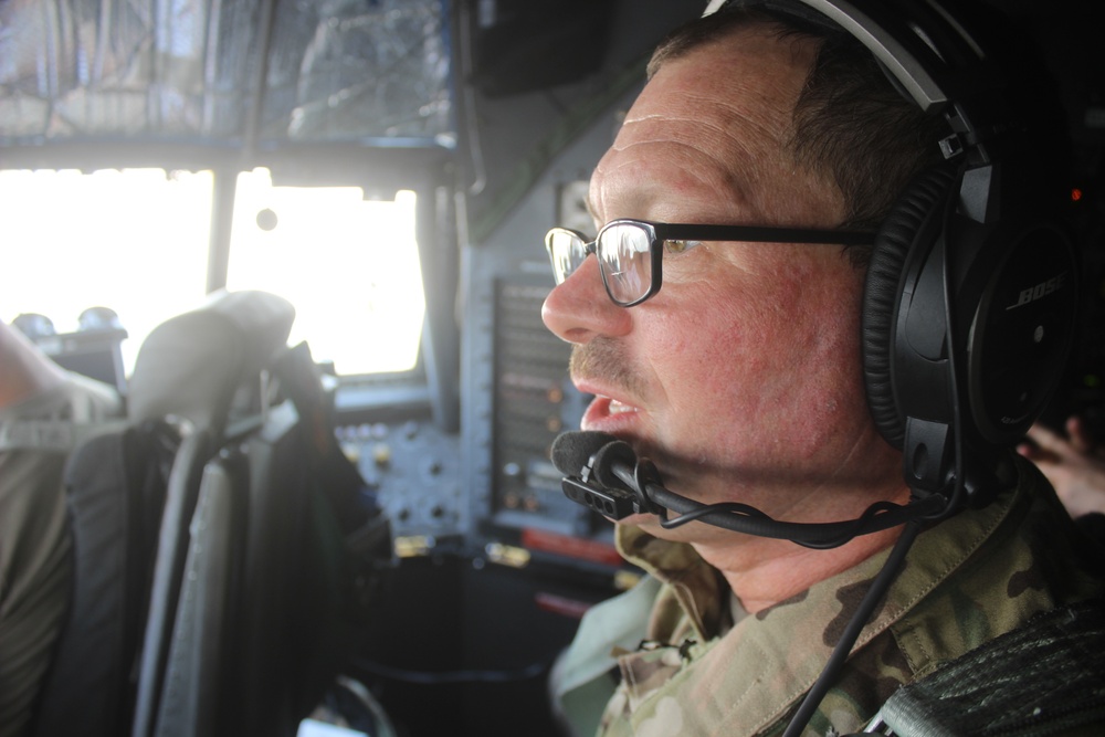 C-130 Hercules flight engineer boosts morale baking