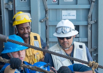 USS Antietam (CG 54) Sailors secure a line during an underway replenishment with USNS Tippecanoe (T-AO-199)