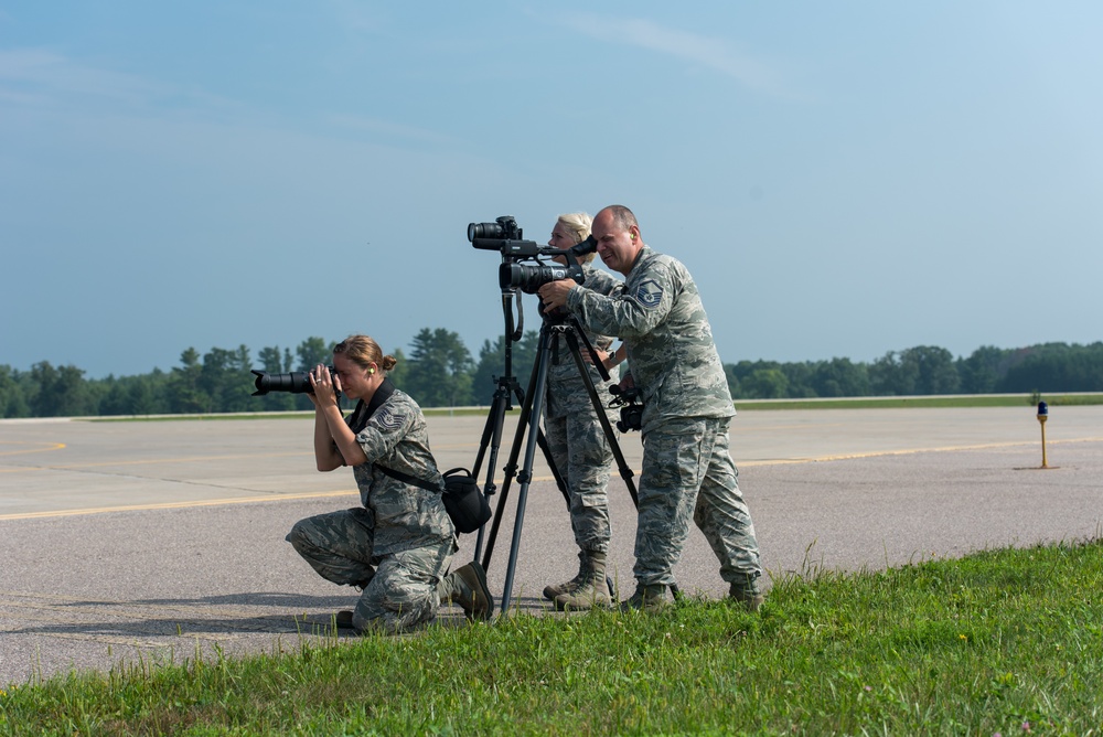 Public affairs Airmen from the 115th Fighter Wing take photos during Northern Lightning
