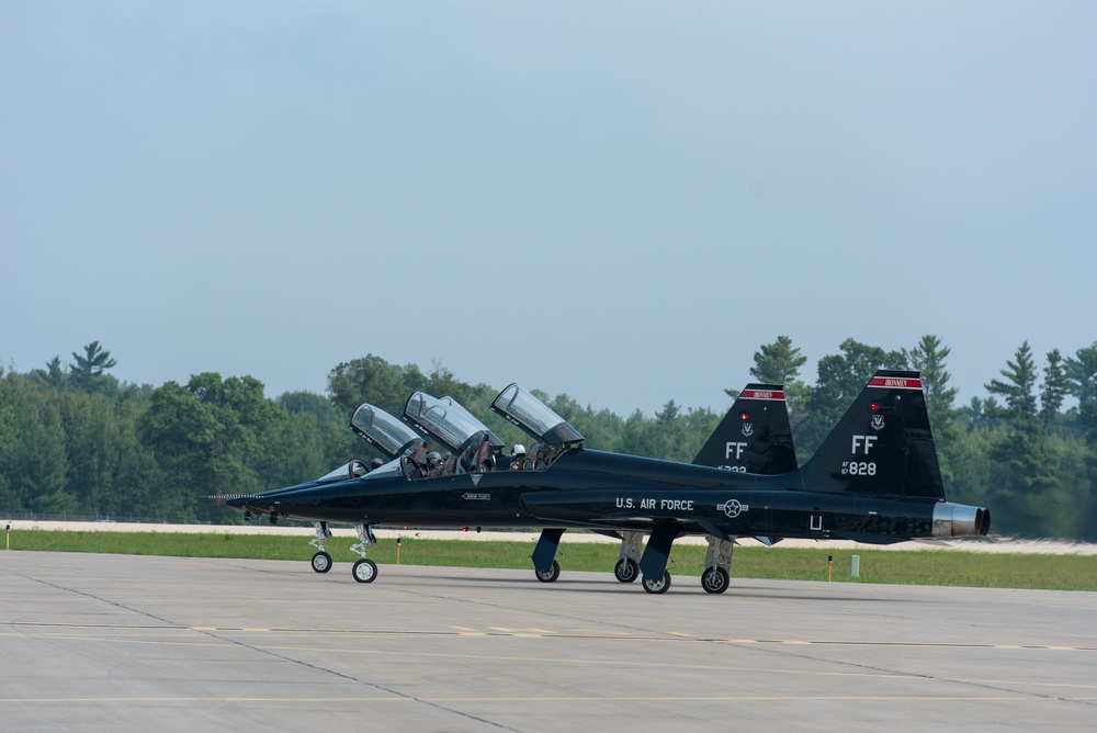Two T-38 Talons hold on the flightline before taking off at Volk Field Air National Guard Base