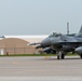 Crew chief marshals F-16 Fighting Falcon