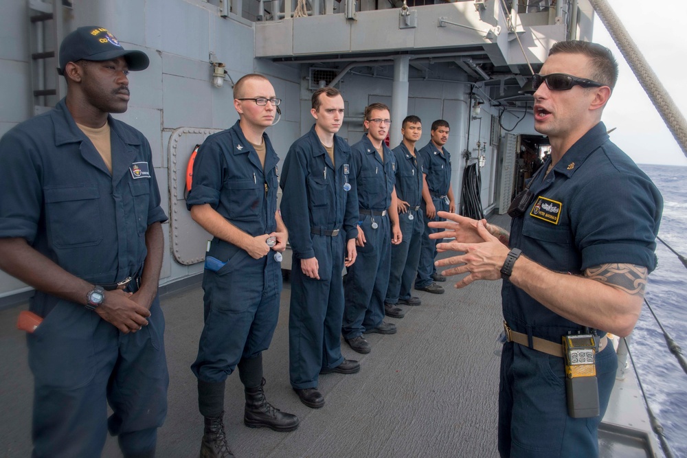 Chief Master of Arms Peter McDonald, from Hackettstown, New Jersey, instructs Sailors during a security training exercise on the Ticonderoga-class guided-missile cruiser USS Antietam (CG 54).