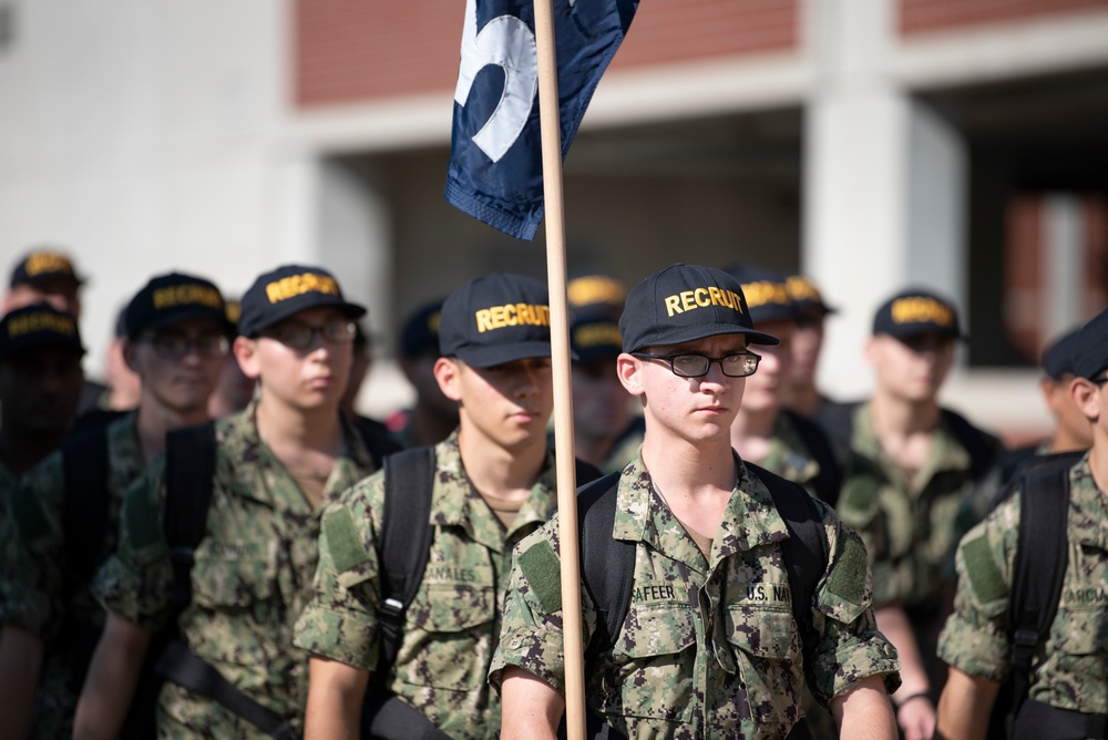 Recruits march after graduation practice