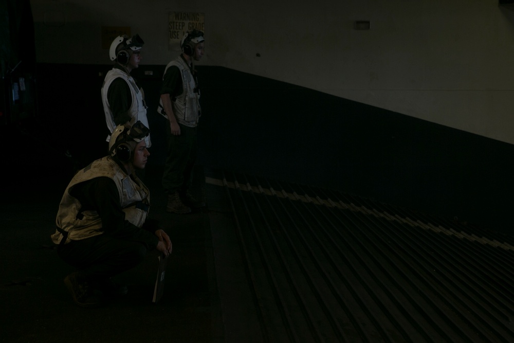 CLB-31 Marines use LCAC to load gear