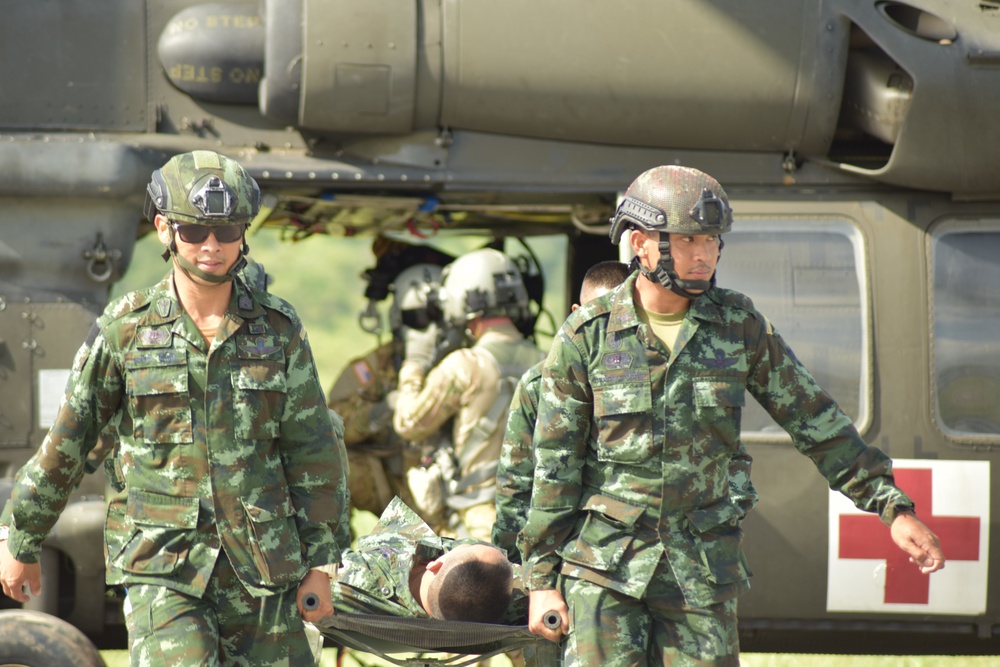 16th CAB, Washington Army National Guard Soldiers conduct air medical evacuation training with Royal Thai Army rangers during Hanuman Guardian 2018