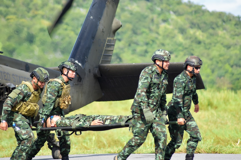 16th CAB, Washington Army National Guard Soldiers conduct air medical evacuation training with Royal Thai Army rangers during Hanuman Guardian 2018