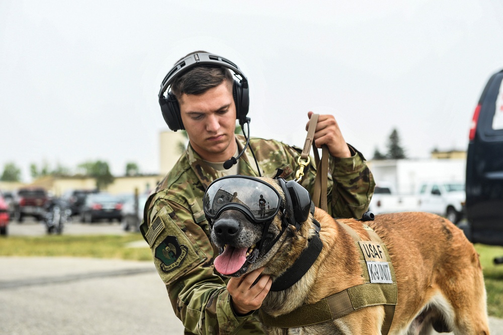 5th SFS MWDs fly with 54th Helicopter Squadron