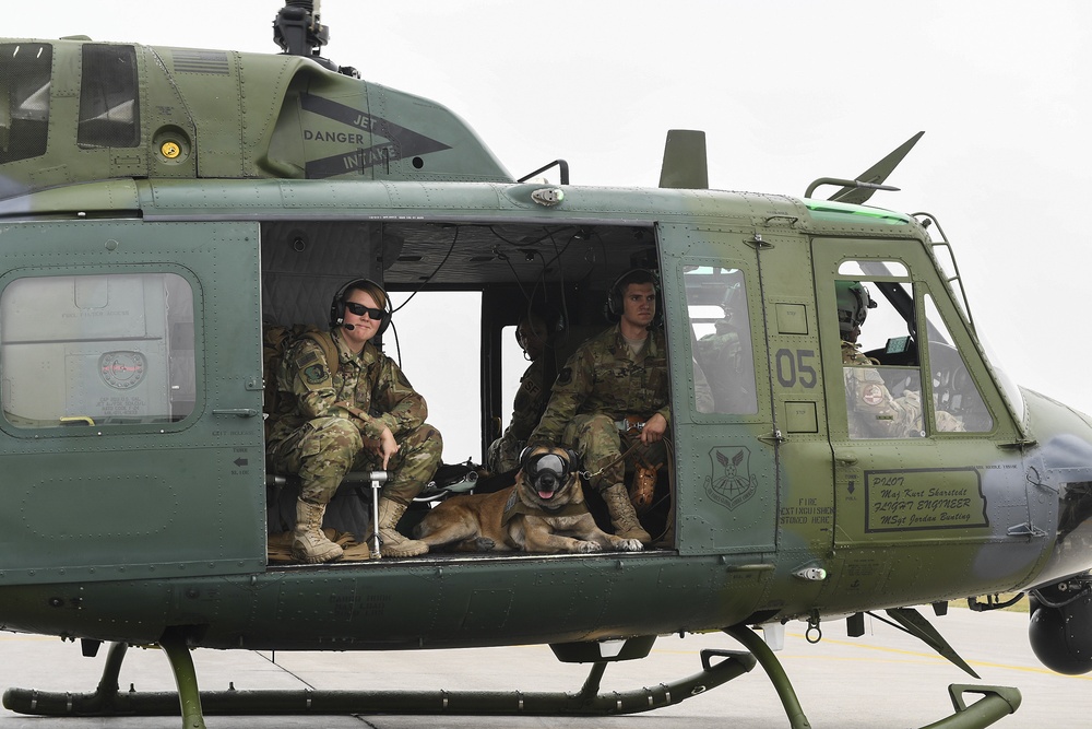 5th SFS MWDs fly with 54th Helicopter Squadron