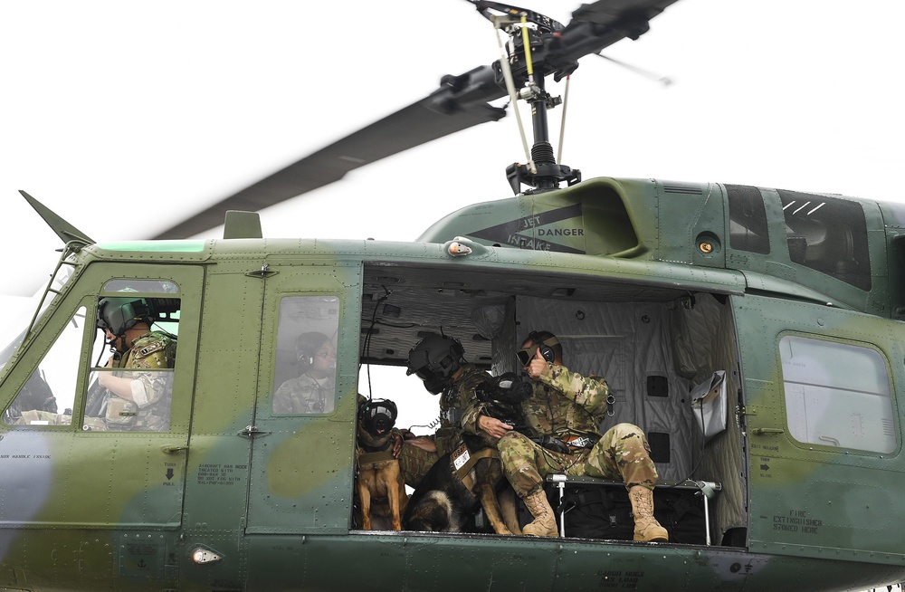 5th SFS MWDs fly with 54th Helicopter Squadron