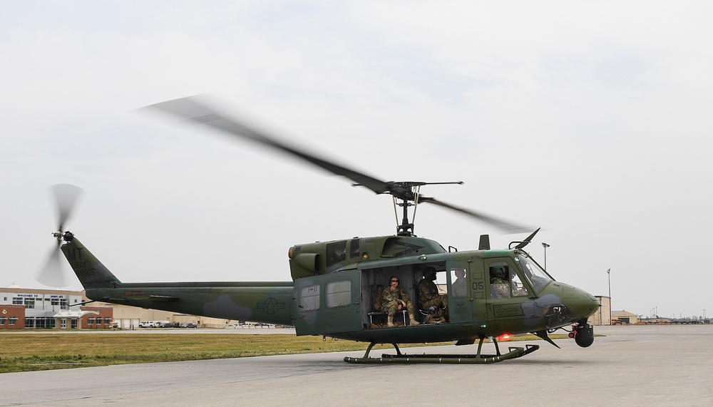 5th SFS MWDs fly with 54th Helicopter Squadron