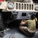 Motor Transport Mechanics repair worn parts on a Humvee