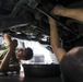 Motor Transport Mechanics repair worn parts on a Humvee