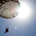 Romanian paratroopers leap from US aircraft
