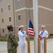 NMTSC Sailors Hoist Flag to Half-Staff