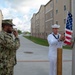 NMTSC Sailors Hoist Flag to Half-Staff