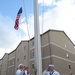 NMTSC Sailors Hoist Flag to Half-Staff