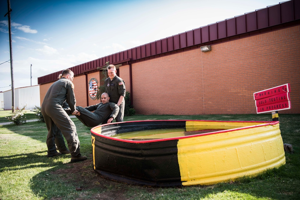 Solo pilot receives dunk tank tradition