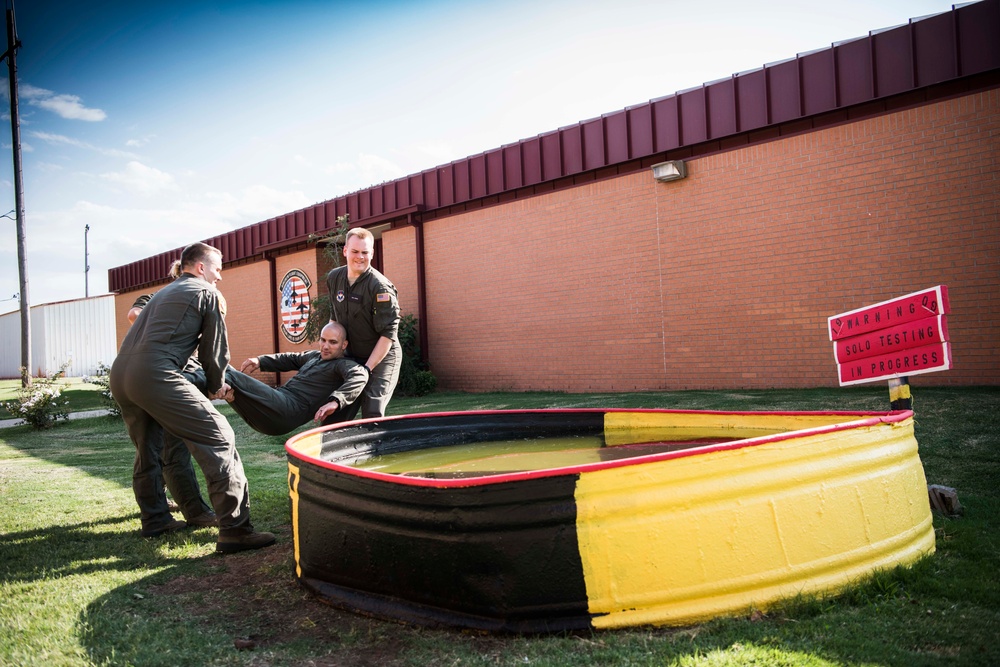 Solo pilot receives dunk tank tradition