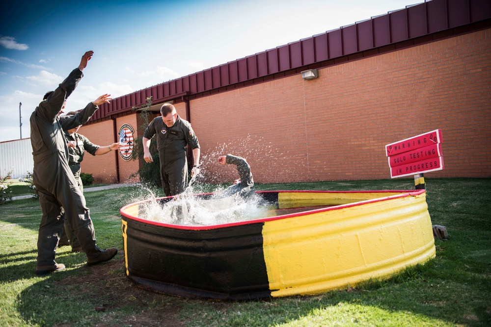 Solo pilot receives dunk tank tradition