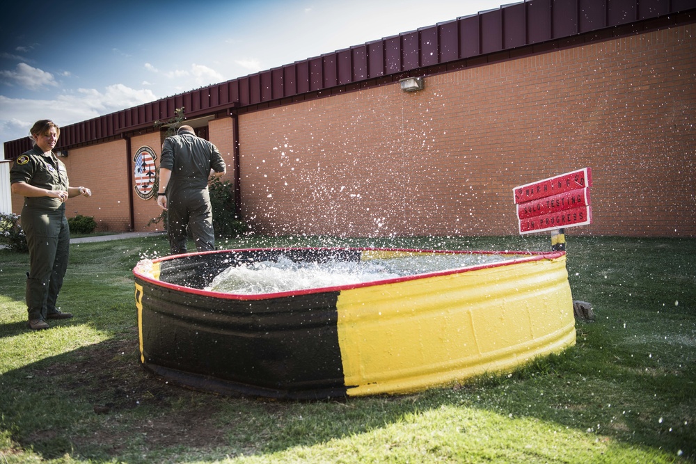 Solo pilot receives dunk tank tradition