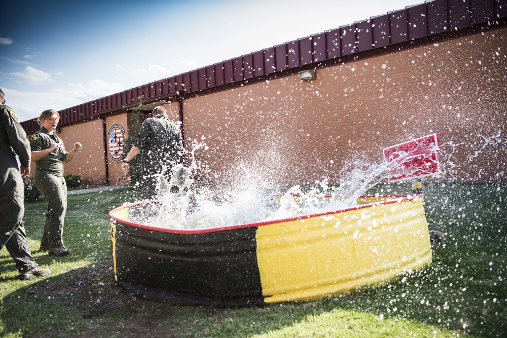 Solo pilot receives dunk tank tradition