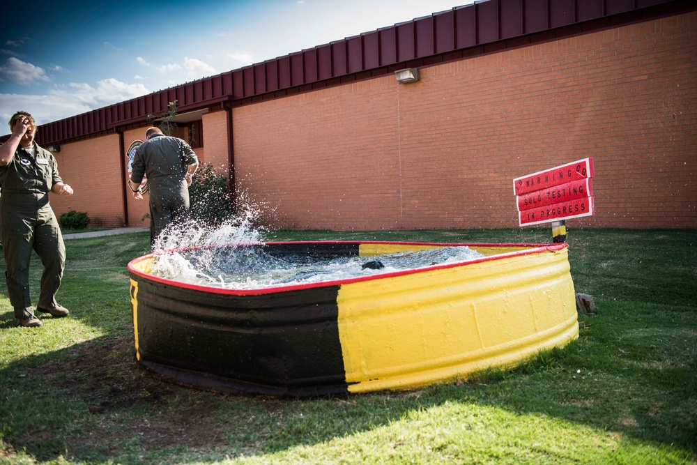 Solo pilot receives dunk tank tradition