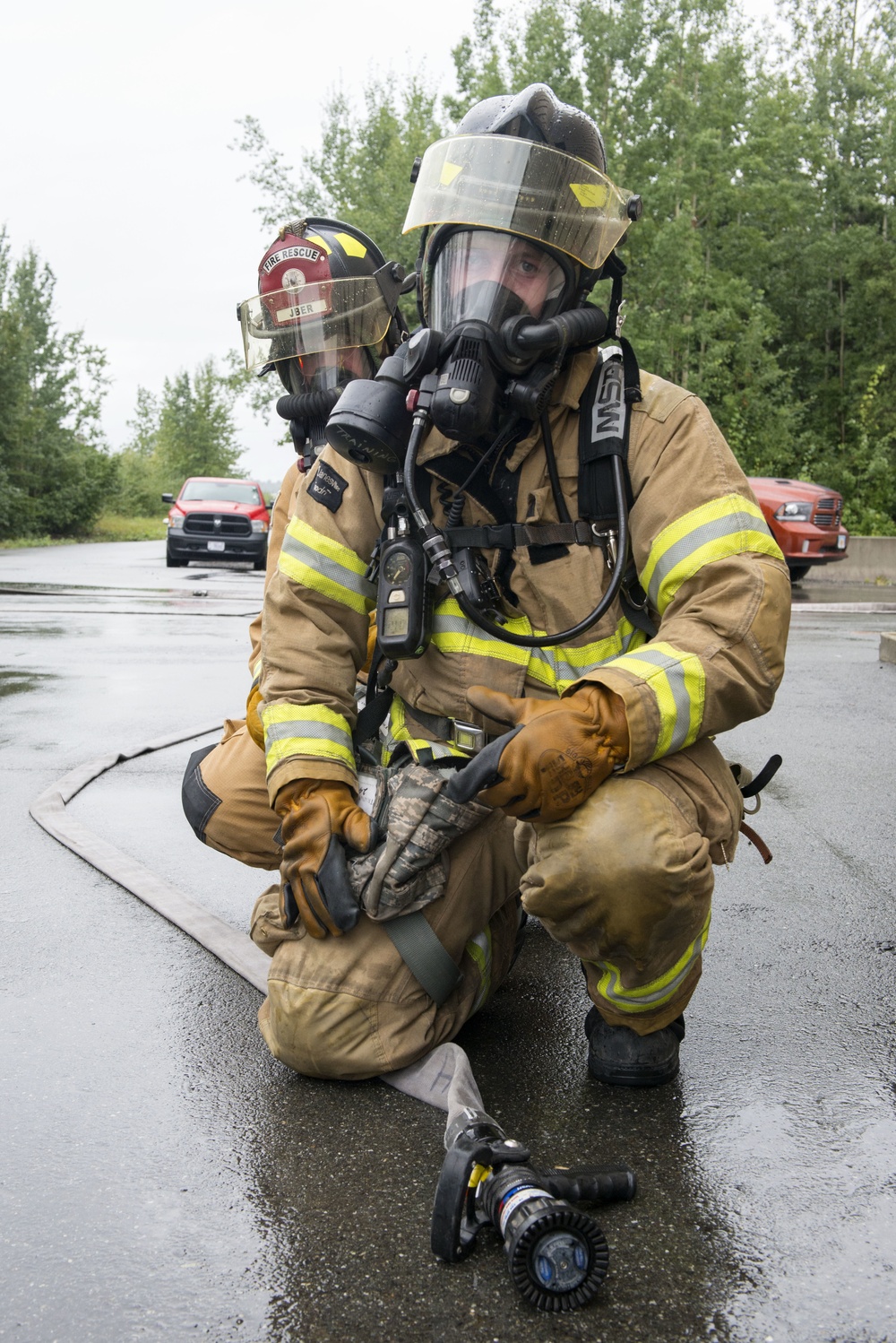 Air Force firefighters conduct wartime-firefighting readiness training at JBER