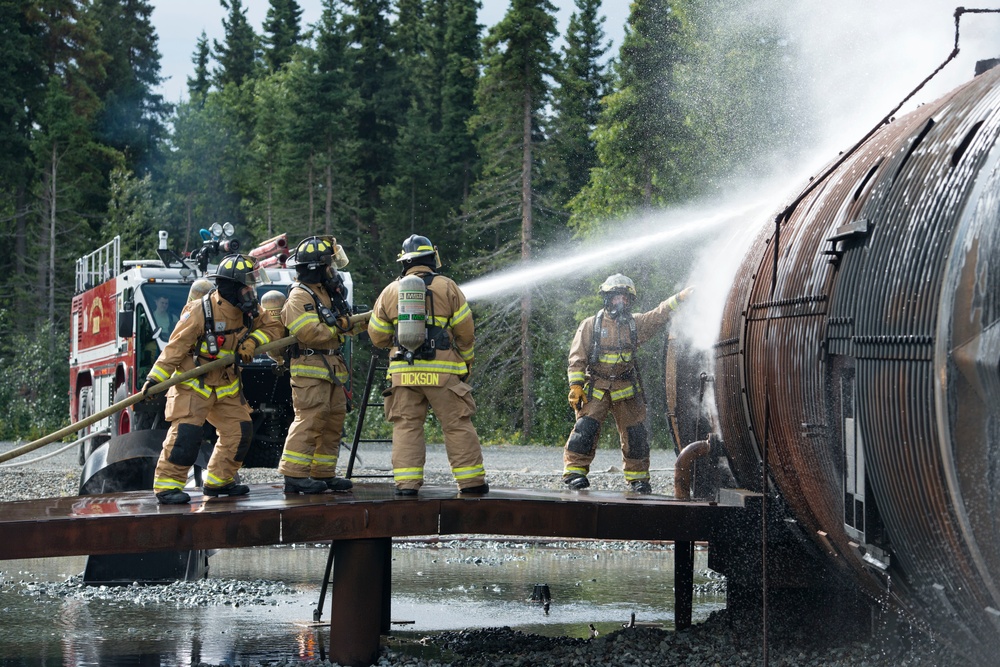 Air Force firefighters conduct wartime-firefighting readiness training at JBER Air Force firefighters conduct wartime-firefighting readiness training at JBER