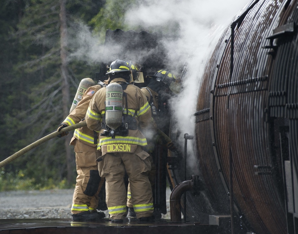 Air Force firefighters conduct wartime-firefighting readiness training at JBER Air Force firefighters conduct wartime-firefighting readiness training at JBER