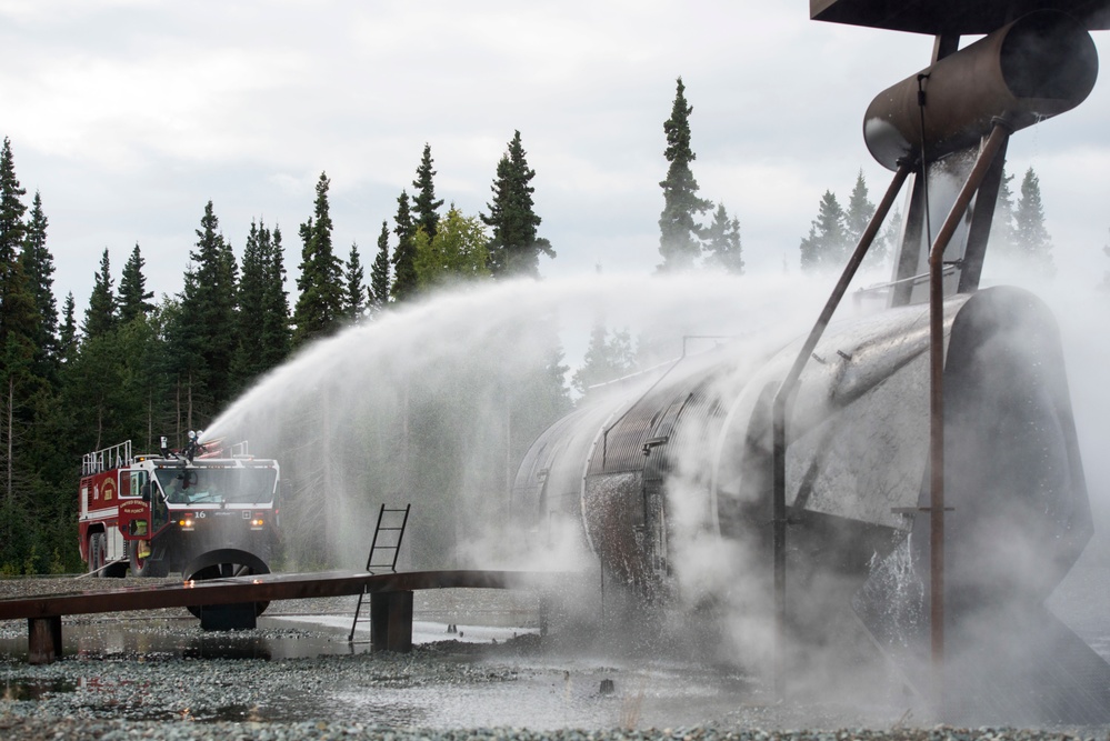 Air Force firefighters conduct wartime-firefighting readiness training at JBER Air Force firefighters conduct wartime-firefighting readiness training at JBER