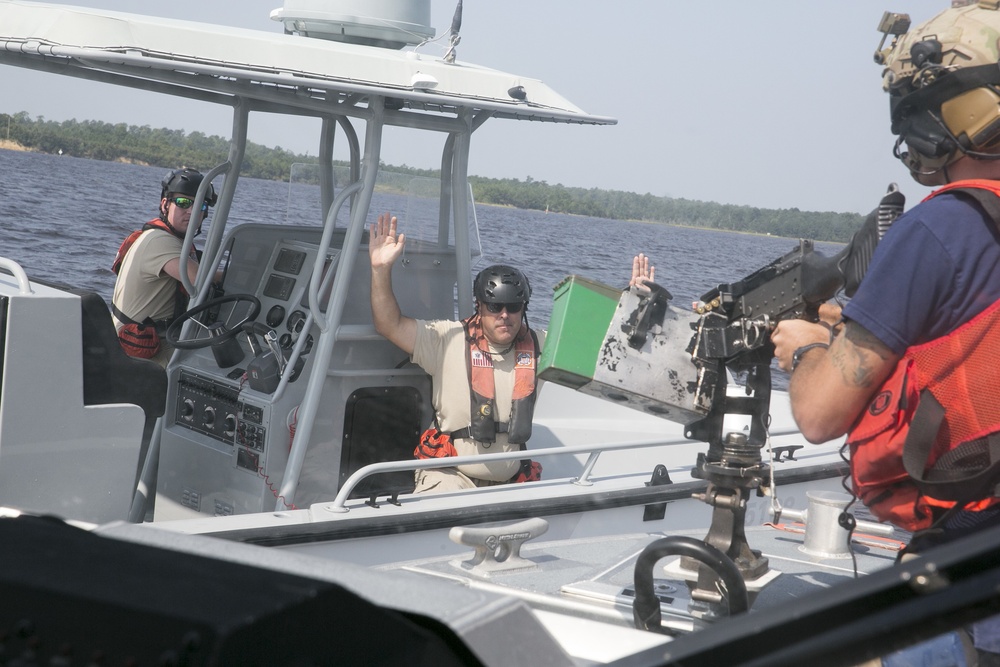 Coast Guardsmen Learning Tactics to Dissuade or Disable