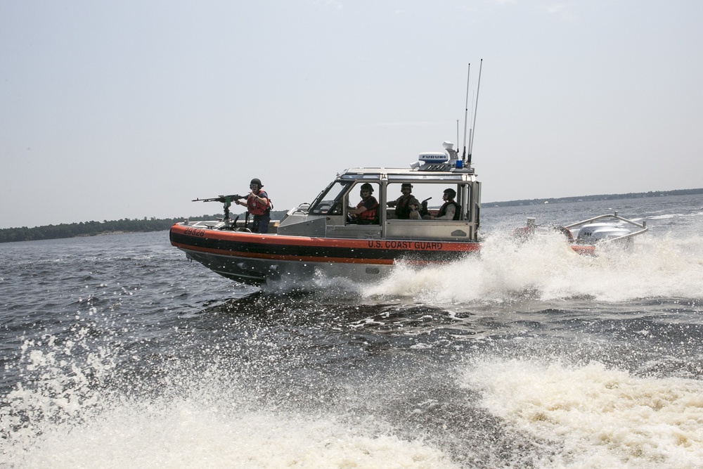Coast Guardsmen Learning Tactics to Dissuade or Disable