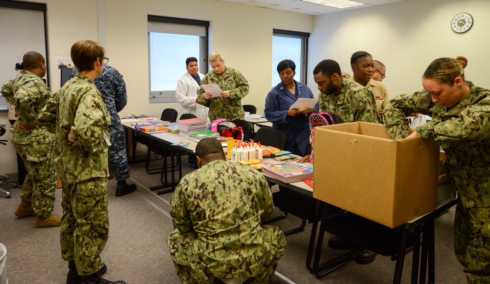 NMCP’s SCPOA Fill Backpacks for the New School Year