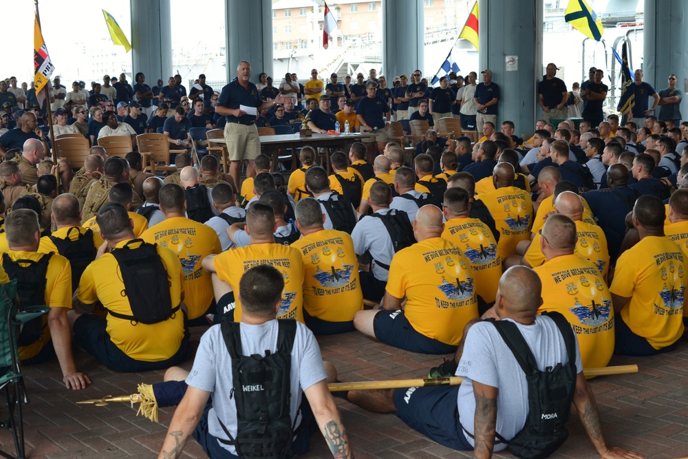 Retired Fleet Master Chief speaks to a sea of CPO selectees