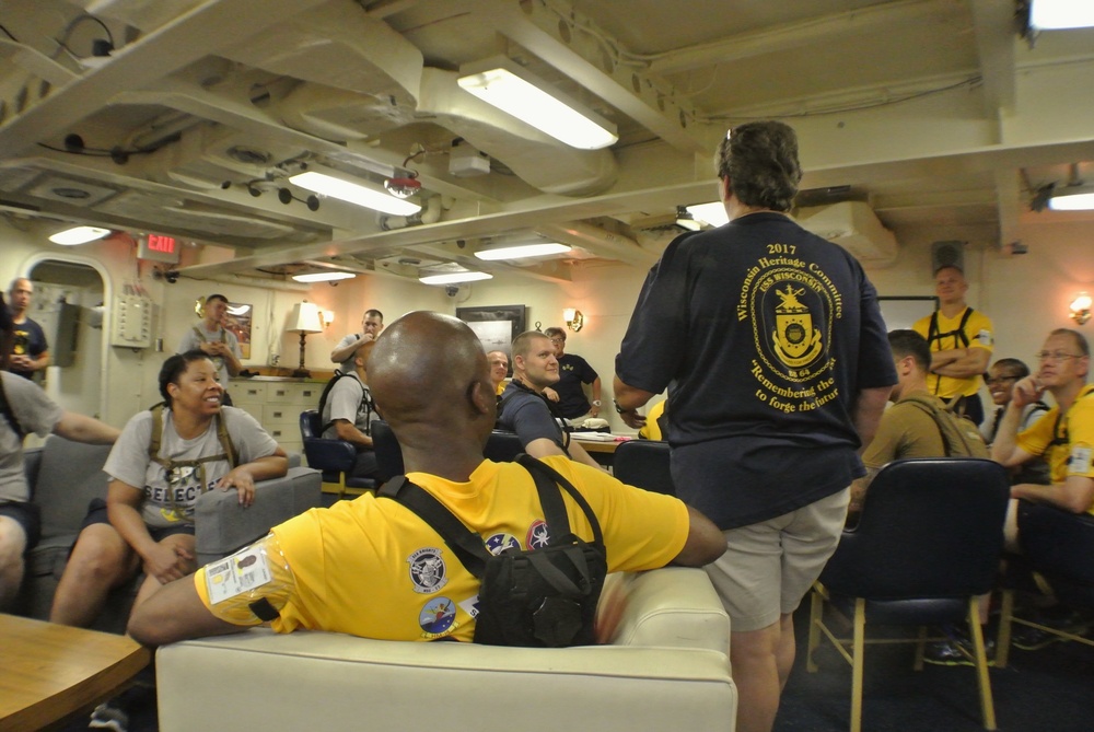 A presentation in the Captains Wardroom aboard the USS Wisconsin (BB-64)