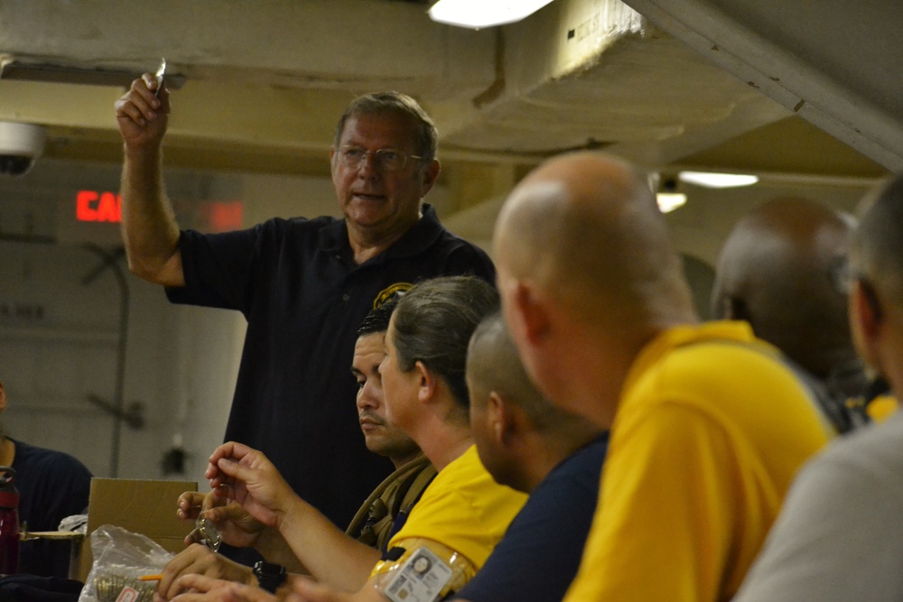 Retired MCPON Bushey speaks to CPO Selects aboard the USS Wisconsin (BB-64)