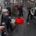 USS America Sailors wash down ship in preparation for Fleet Week