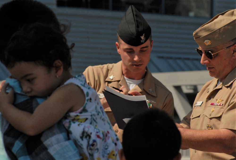 USS Wisconsin (BB-64) hosts a re-enlistment ceremony